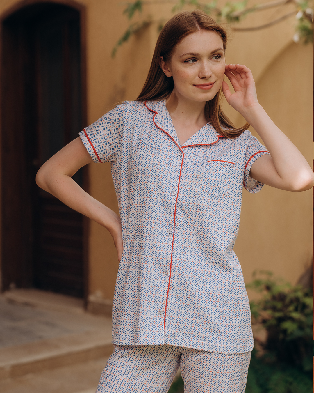 Classic women's pajamas with buttons, a pocket on the chest
