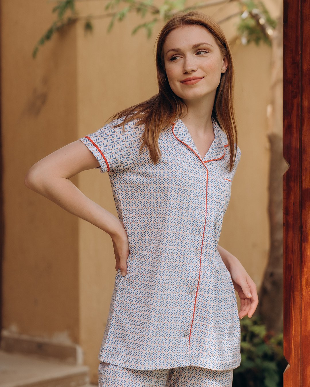 Classic women's pajamas with buttons, a pocket on the chest