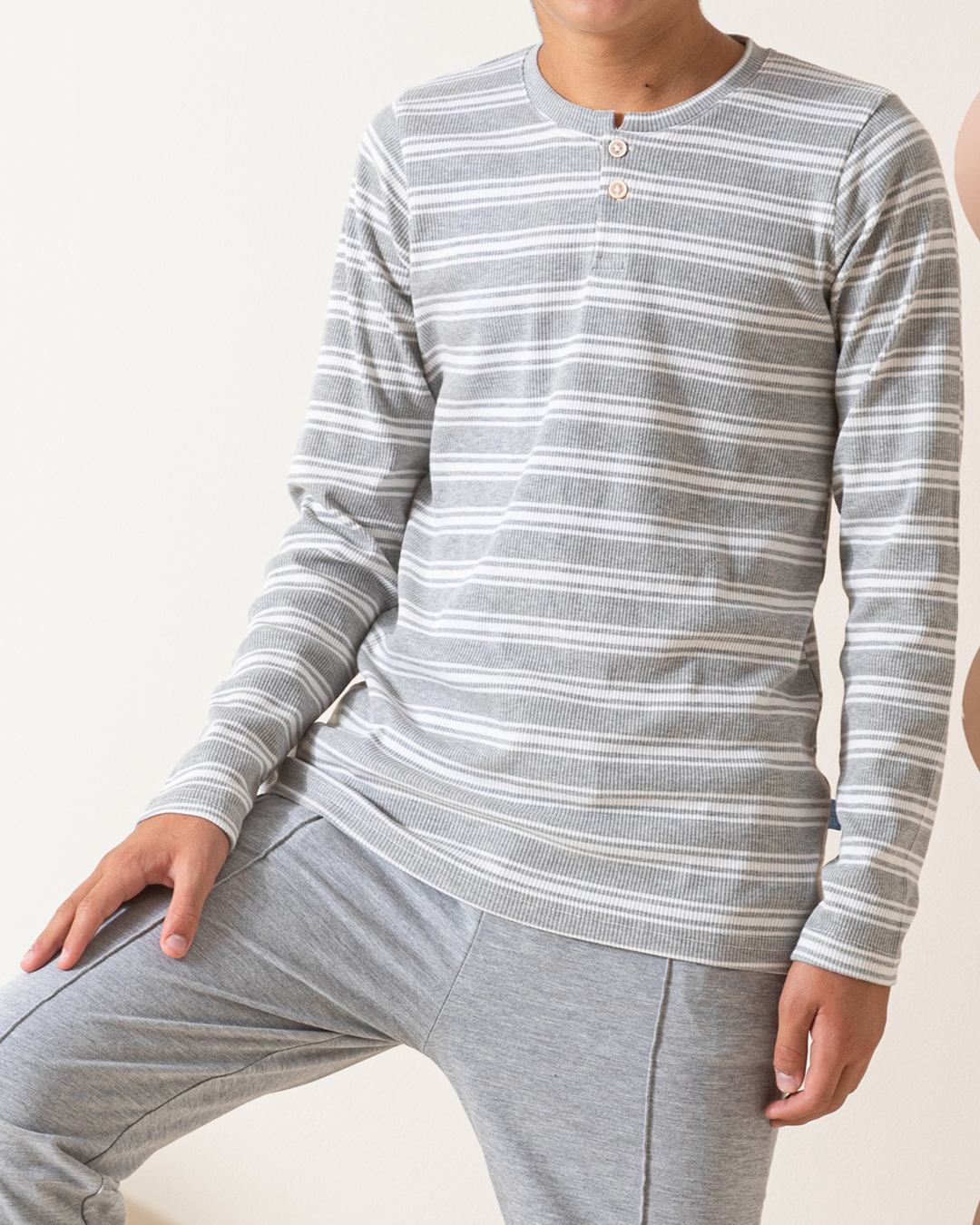Long-sleeved Ribbed Cotton shirts with a button placket.